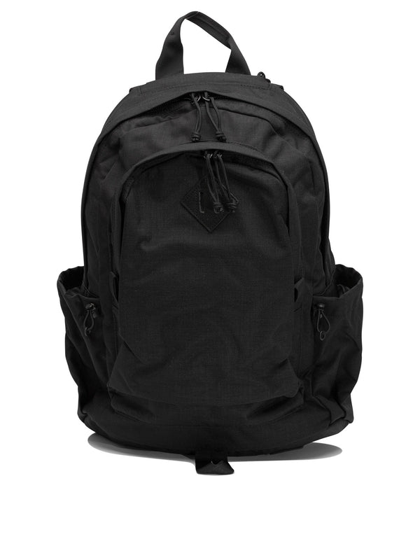 Beams + Black Backpacks