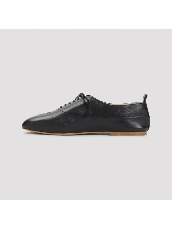 Triomphe Lise Black Leather Loafers