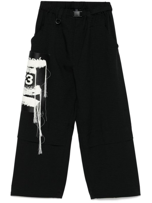 Graphic Logo
  Detail Belt Pants
