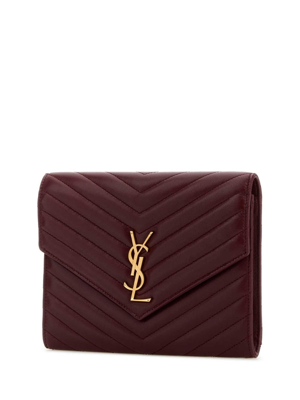 Cassandra Logo Trim Leather Clutch Bag