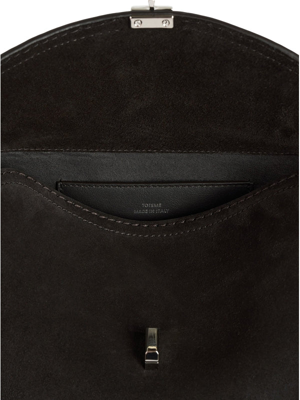 T Lock Leather Clutch Bag