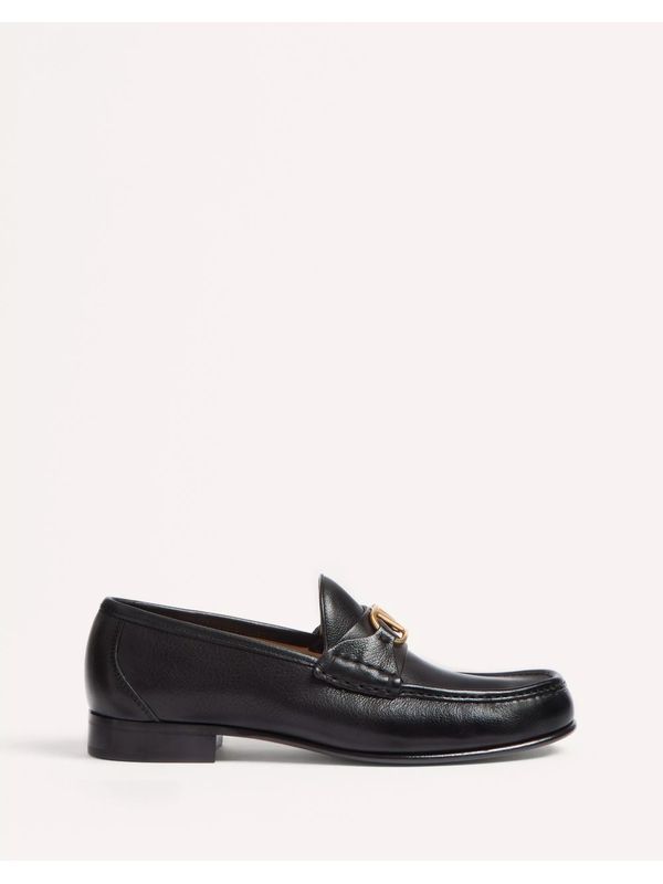 V Logo
  Decorated Leather Loafers