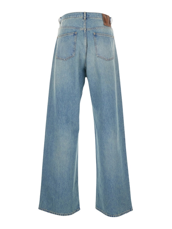 Blue Five-Pocket Jeans with Applied Logo Patch on the Back in Denim Man Denim Pants