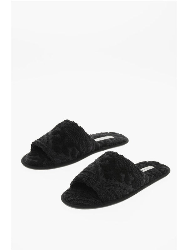 The Row Black Slides