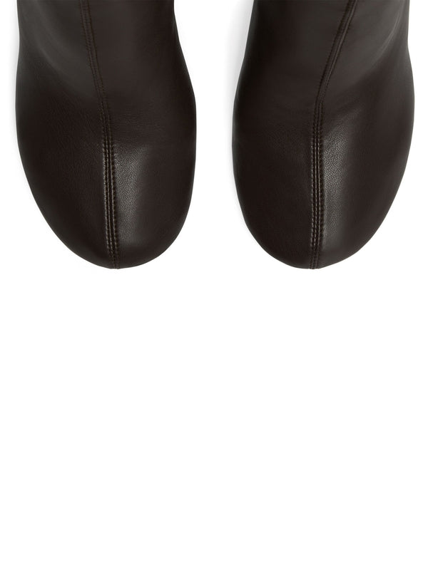 斜纹仿皮高跟靴