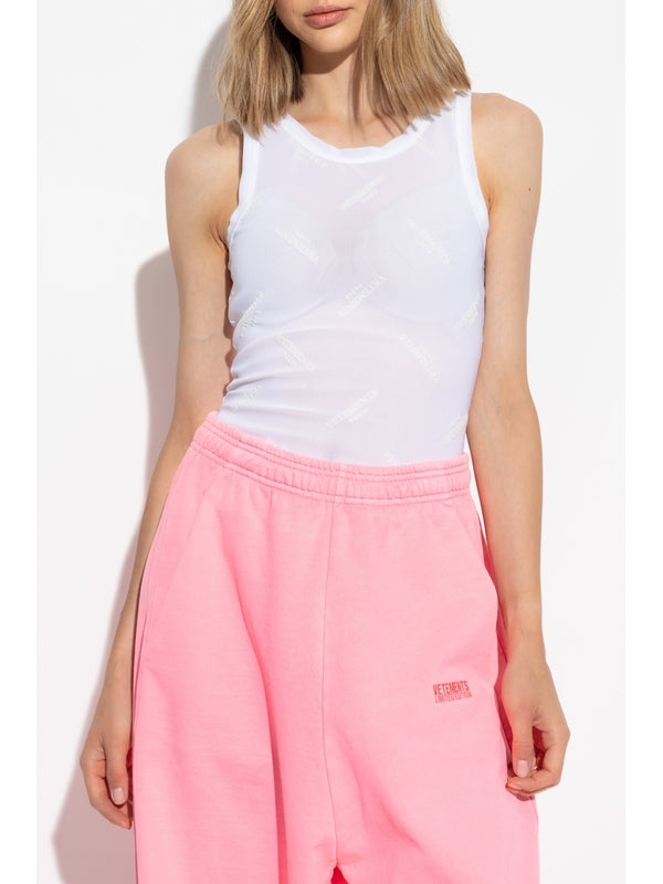 All-Over Logo
  Mesh Sleeveless Top