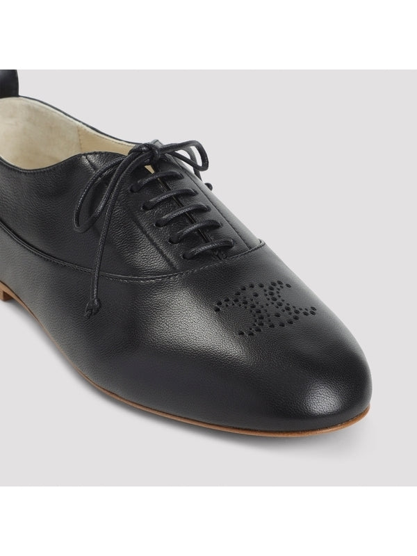 Triomphe Lise Black Leather Loafers