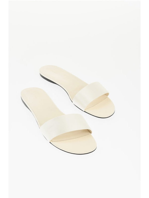 The Row Ivory Slides