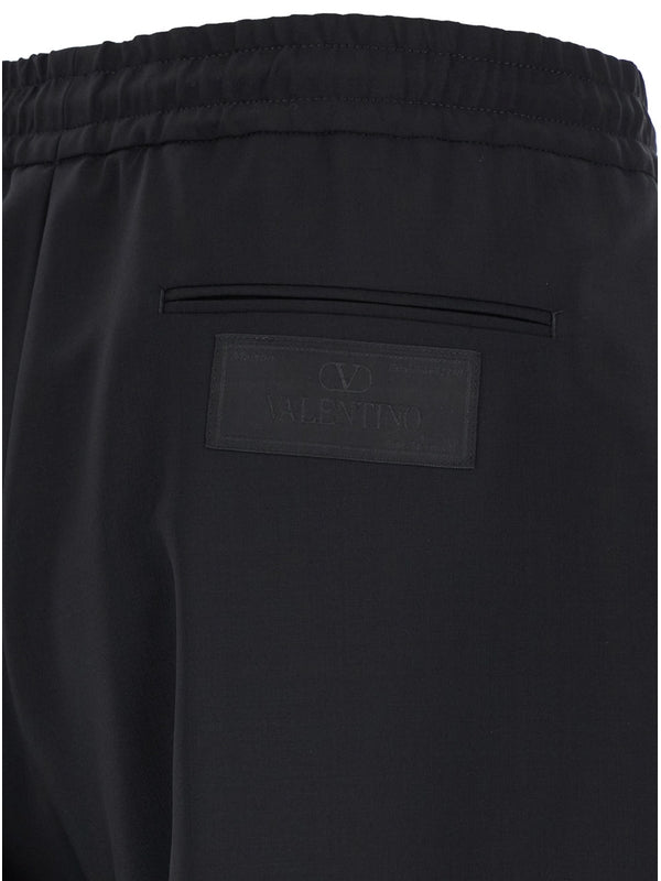 Black Jogger Pants with Logo Patch in Wool Blend Man Trousers